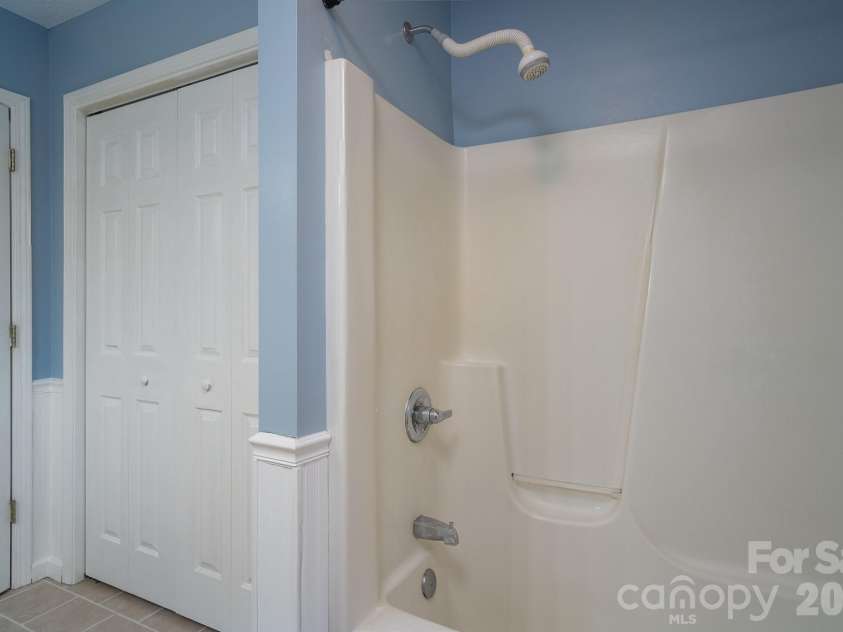 17 Squires Lane, Candler, NC 28715.  MLS# CAR4372745, YatesRealty ID 32899. More storage with this large linen closet.