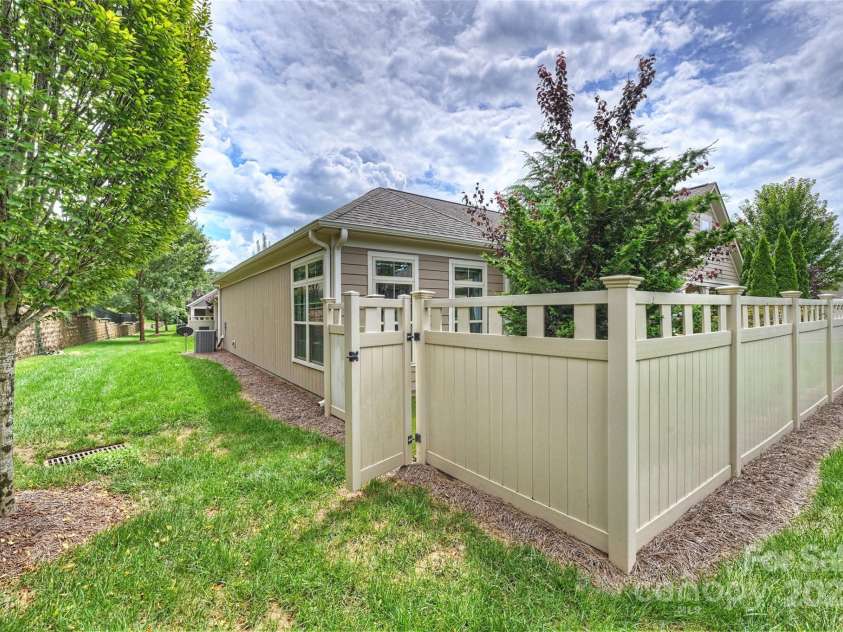 1281 Restoration Drive, Waxhaw, NC 28173.  MLS# CAR4274527, YatesRealty ID 32902. Back gate to get out of the Courtyard