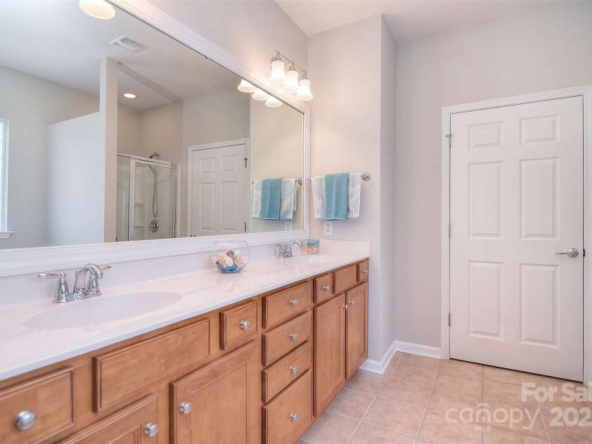 1008 Magpie Court, Fort Mill, SC 29707.  MLS# CAR4292540, YatesRealty ID 32913. Double vanity in master bath