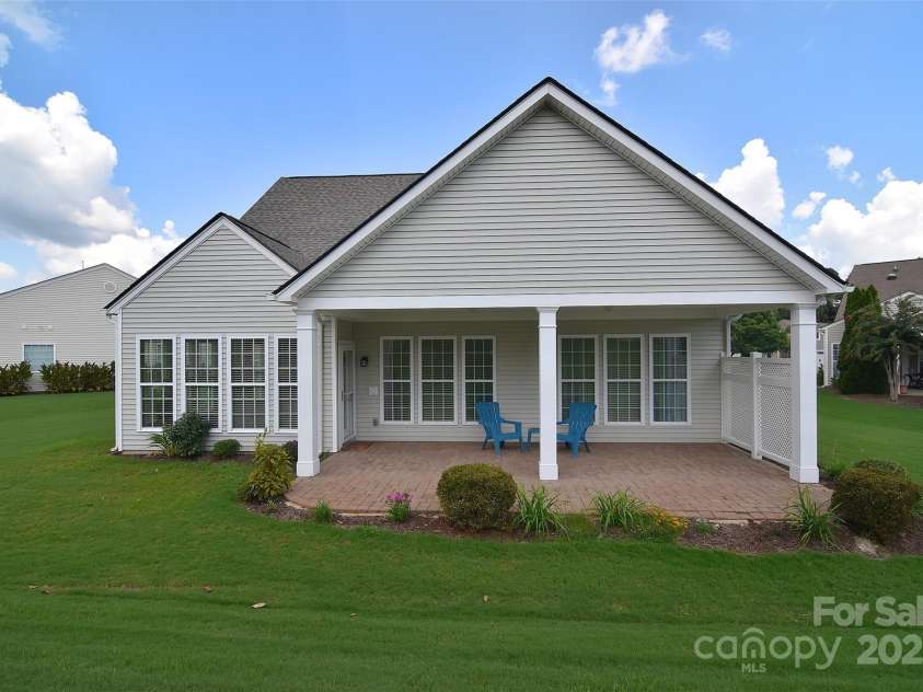 1008 Magpie Court, Fort Mill, SC 29707.  MLS# CAR4292540, YatesRealty ID 32913. Great backyard with covered patio