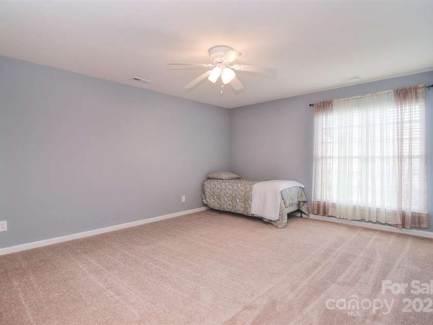 1008 Magpie Court, Fort Mill, SC 29707.  MLS# CAR4292540, YatesRealty ID 32913. Large 3rd bedroom on 2nd floor with walk-in closet