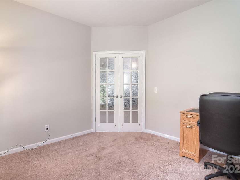 1008 Magpie Court, Fort Mill, SC 29707.  MLS# CAR4292540, YatesRealty ID 32913. Office doors leading to living room