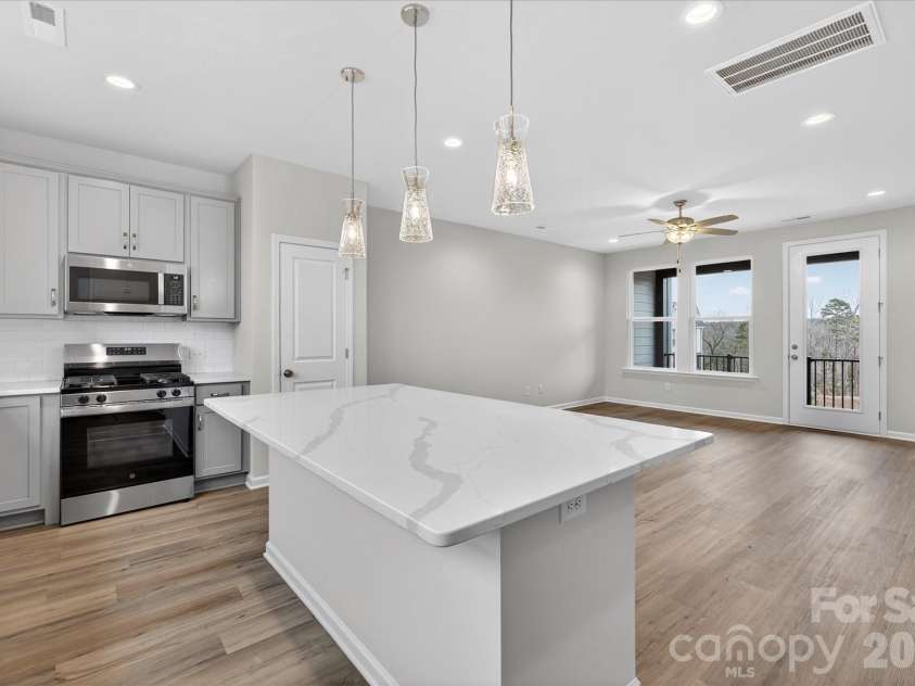 242 Ferebee Place, Charlotte, NC 28213.  MLS# CAR4322624, YatesRealty ID 3292. Kitchen/Living