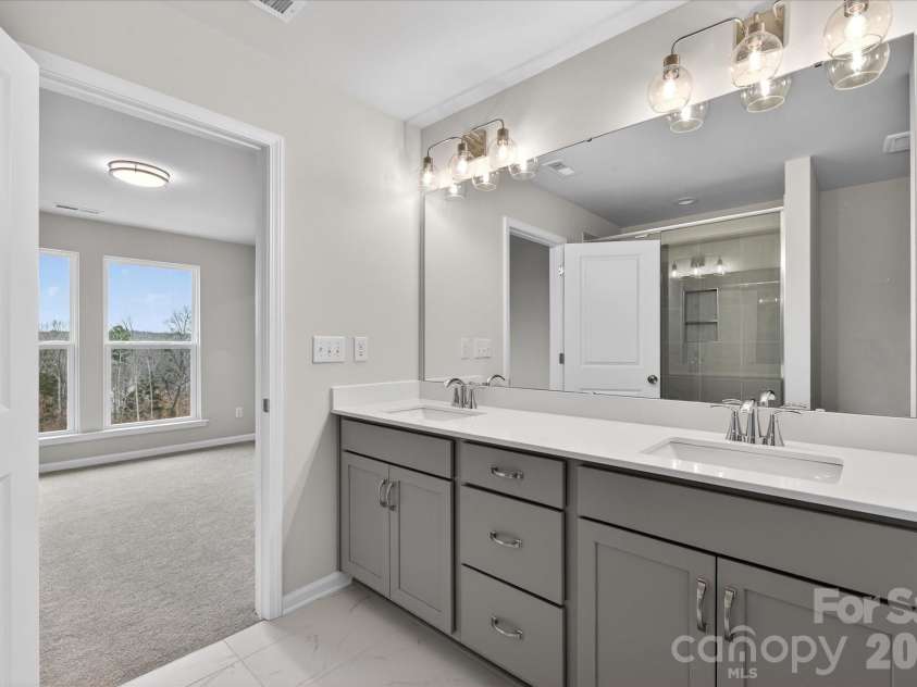 242 Ferebee Place, Charlotte, NC 28213.  MLS# CAR4322624, YatesRealty ID 3292. Premier Bath