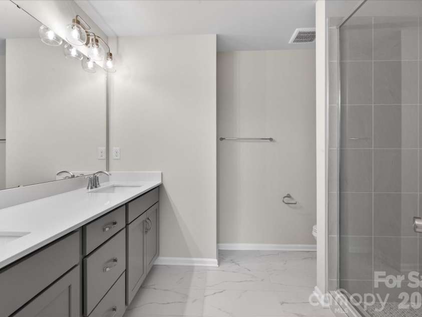 242 Ferebee Place, Charlotte, NC 28213.  MLS# CAR4322624, YatesRealty ID 3292. Premier Bath