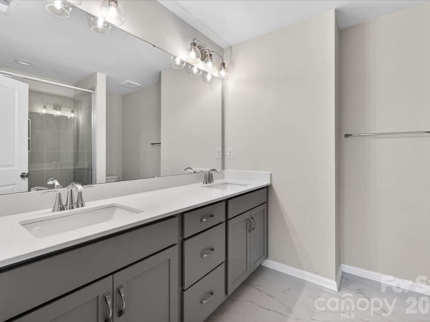 242 Ferebee Place, Charlotte, NC 28213.  MLS# CAR4322624, YatesRealty ID 3292. Premier Bath