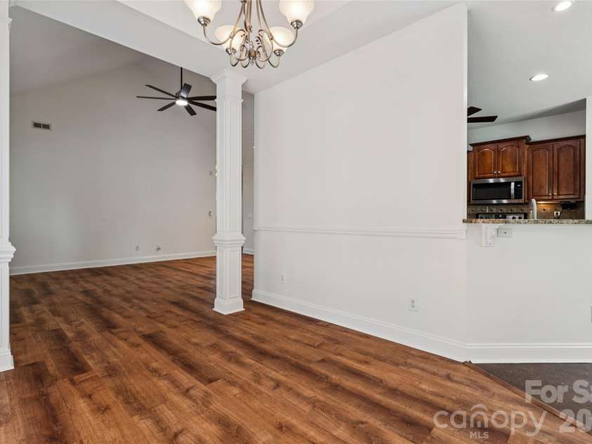 3078 Richards Way Drive, Rock Hill, SC 29732.  MLS# CAR4394528, YatesRealty ID 32922. Dining room is separated from living room with graceful columns and detailed millwork