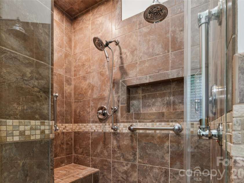 3078 Richards Way Drive, Rock Hill, SC 29732.  MLS# CAR4394528, YatesRealty ID 32922. Get ready for some serious relaxation! This oversized shower offers dual shower heads, a built in bench plus storage. 