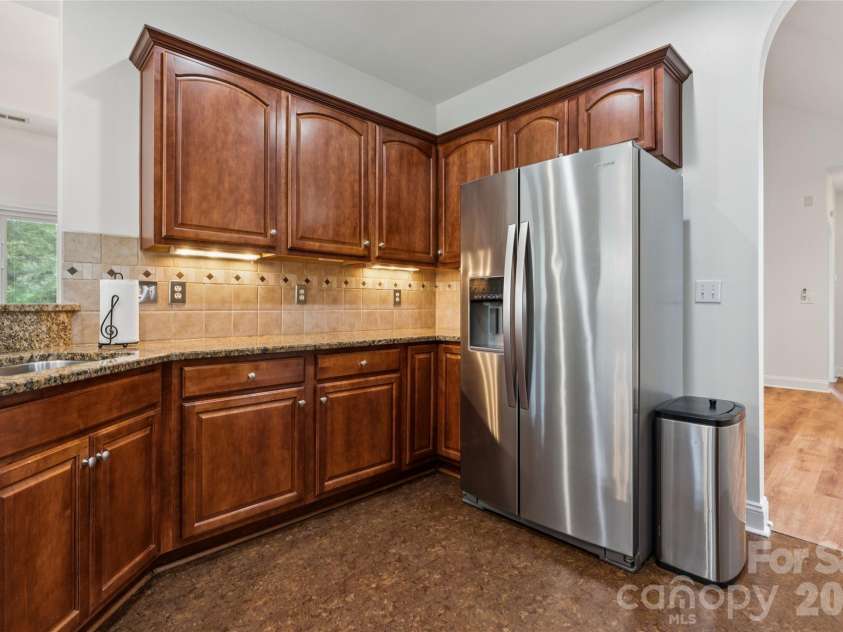 3078 Richards Way Drive, Rock Hill, SC 29732.  MLS# CAR4394528, YatesRealty ID 32922. Upgraded kitchen boasts Whirlpool stainless steel appliances, tile backsplash, and granite counters