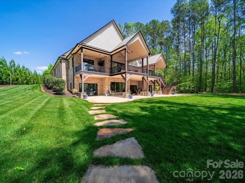 1579 Sunset Pointe Drive, Salisbury, NC 28146.  MLS# CAR4386995, YatesRealty ID 32928. Back right side of Home