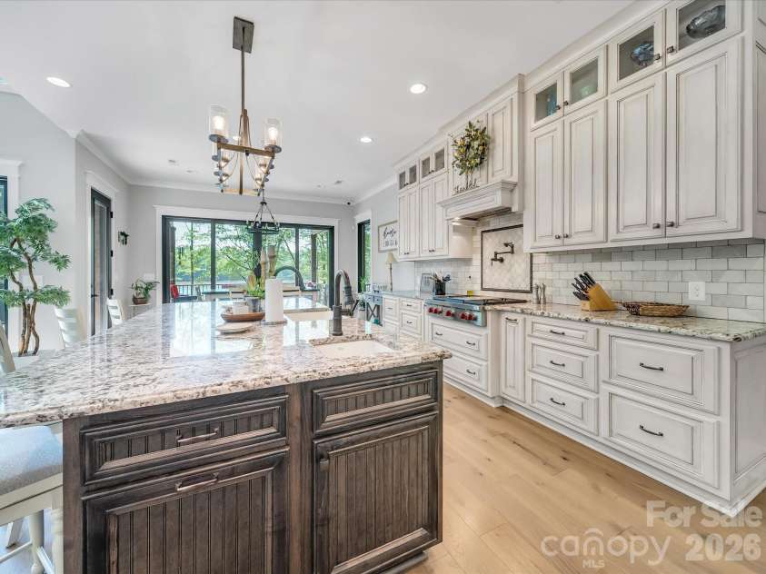 1579 Sunset Pointe Drive, Salisbury, NC 28146.  MLS# CAR4386995, YatesRealty ID 32928. Kitchen displaying island and Breakfast area