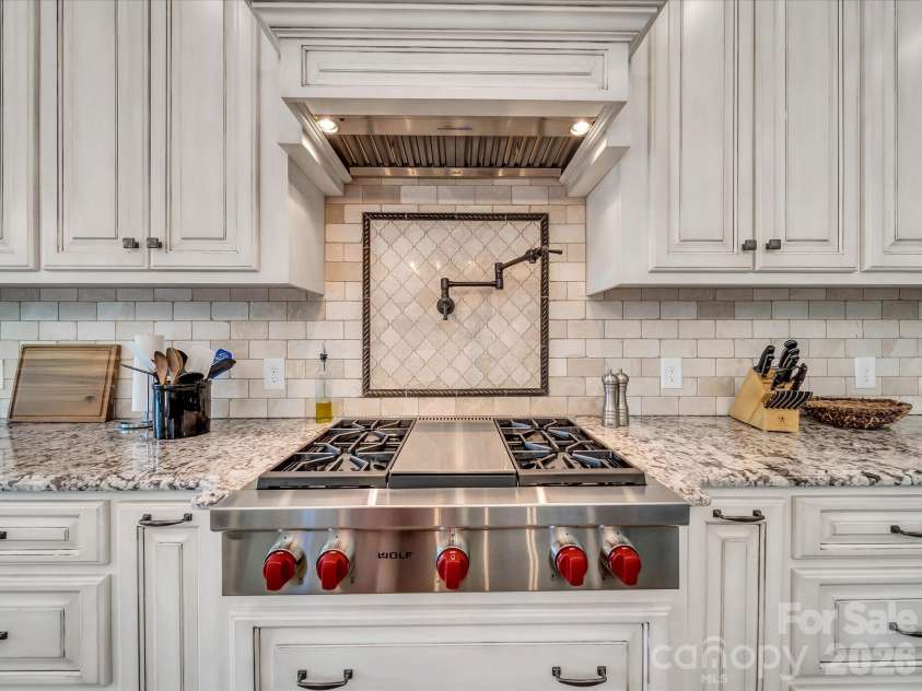 1579 Sunset Pointe Drive, Salisbury, NC 28146.  MLS# CAR4386995, YatesRealty ID 32928. Kitchen with Wolf Cook-Top