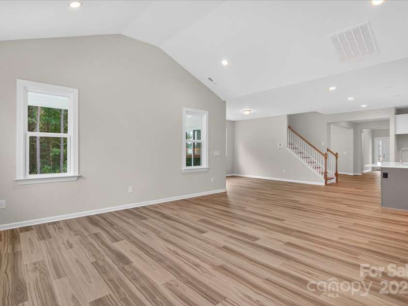 7926 Rolling Wheels Road, Charlotte, NC 28215.  MLS# CAR4289373, YatesRealty ID 3293. Family Room/Kitchen/Dining