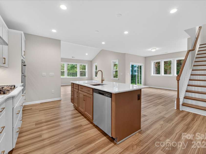 7926 Rolling Wheels Road, Charlotte, NC 28215.  MLS# CAR4289373, YatesRealty ID 3293. Kitchen/Dining/Family Room