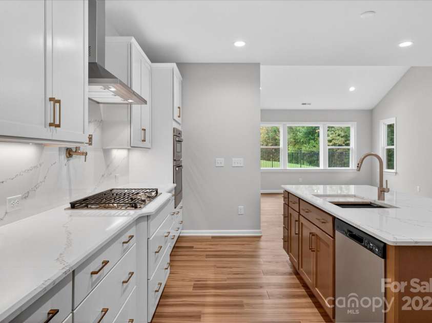 7926 Rolling Wheels Road, Charlotte, NC 28215.  MLS# CAR4289373, YatesRealty ID 3293. Kitchen/Family Room