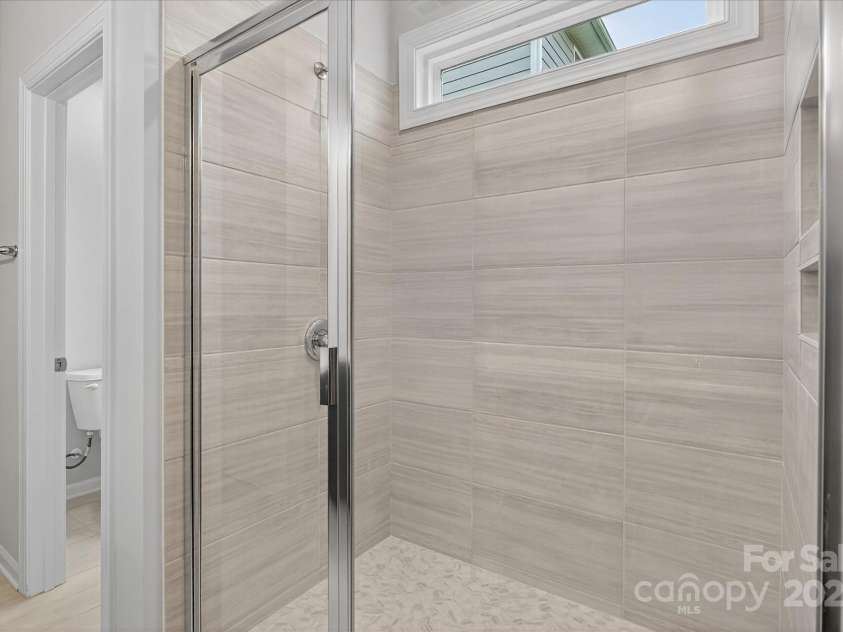 7926 Rolling Wheels Road, Charlotte, NC 28215.  MLS# CAR4289373, YatesRealty ID 3293. Premier Bath