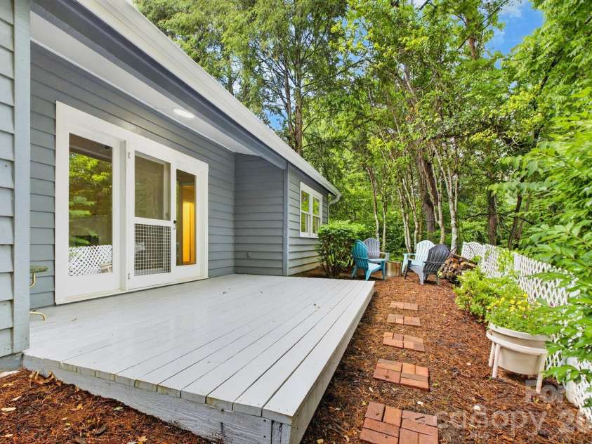 10 Laurel Place Drive, Asheville, NC 28803.  MLS# CAR4370539, YatesRealty ID 32935. Back patio facing sitting area.