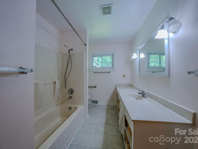 105 Alexander Avenue, Swannanoa, NC 28778.  MLS# CAR4289989, YatesRealty ID 32936. Bathroom by the 3 bedrooms