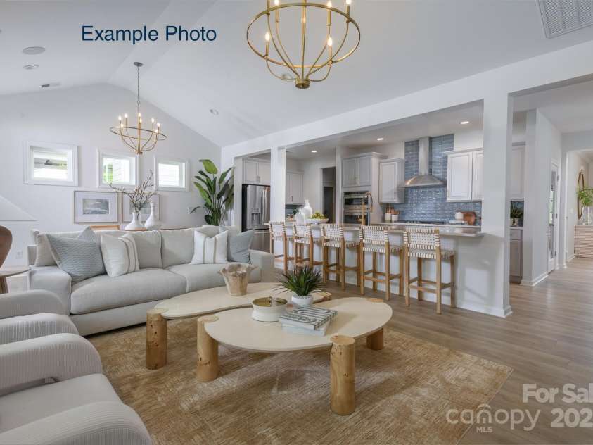 115 Tonbridge Way, Mooresville, NC 28115.  MLS# CAR4305877, YatesRealty ID 3294. Example Photo - Family Room/Dining/Kitchen *Kitchen shows optional split cooking upgrade