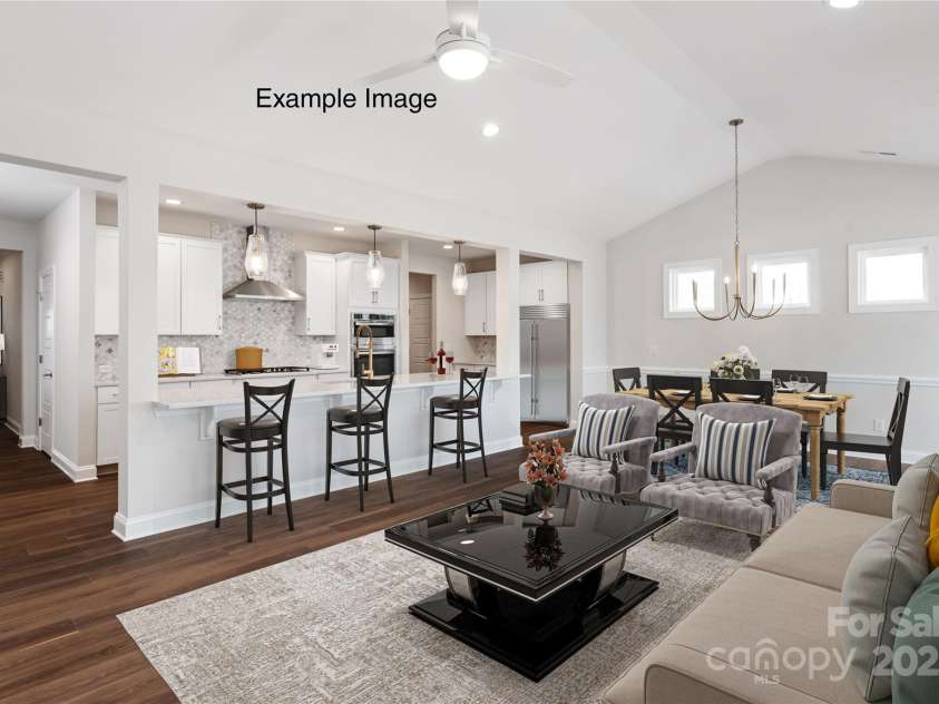 115 Tonbridge Way, Mooresville, NC 28115.  MLS# CAR4305877, YatesRealty ID 3294. Example Photo - Family Room/Dining/Kitchen *Kitchen shows optional split cooking upgrade