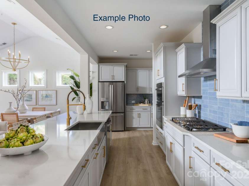 115 Tonbridge Way, Mooresville, NC 28115.  MLS# CAR4305877, YatesRealty ID 3294. Example Photo - Kitchen with optional split cooking upgrade