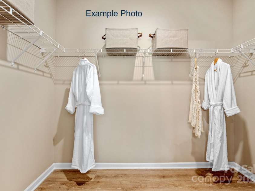 115 Tonbridge Way, Mooresville, NC 28115.  MLS# CAR4305877, YatesRealty ID 3294. Example Photo - Premier Walk-in Closet