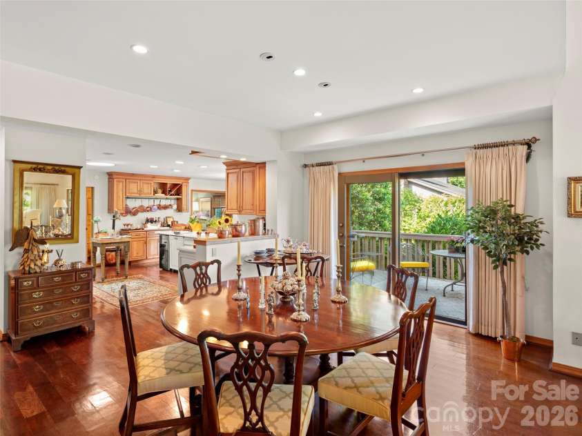20 Clubside Drive, Asheville, NC 28804.  MLS# CAR4393618, YatesRealty ID 32941. Dining Room open to the kitchen and deck access
