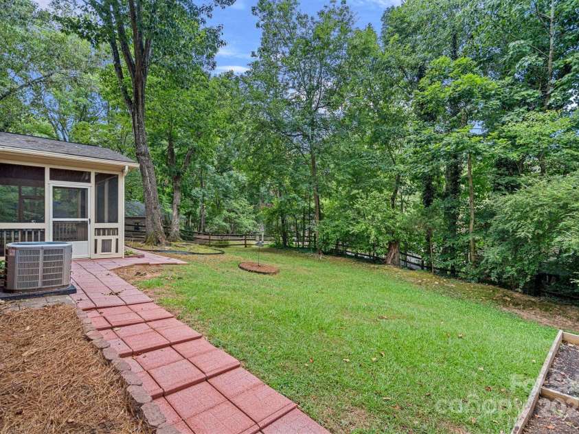 801 Odell Court, Matthews, NC 28105.  MLS# CAR4278079, YatesRealty ID 32943. Backyard