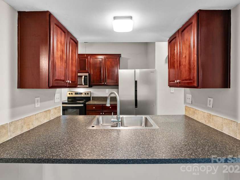 8100 Bald Ridge Drive, Charlotte, NC 28227.  MLS# CAR4291994, YatesRealty ID 32944. 