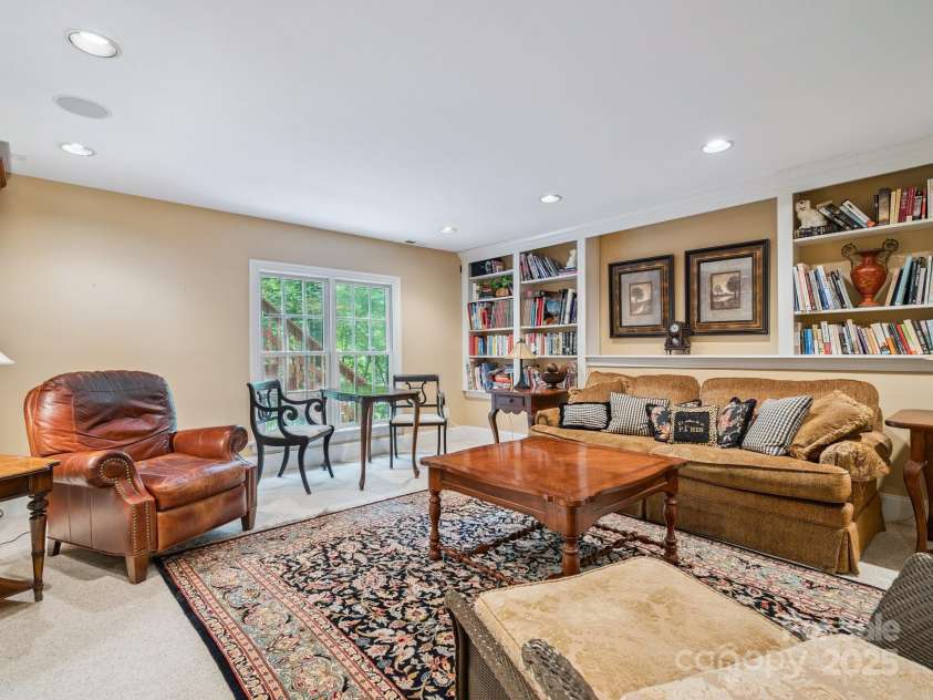 423 Shrewsbury Lane, Matthews, NC 28105.  MLS# CAR4283550, YatesRealty ID 32948. Basement with built ins