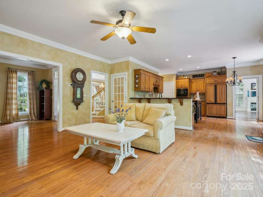 423 Shrewsbury Lane, Matthews, NC 28105.  MLS# CAR4283550, YatesRealty ID 32948. Great Room open to Dining Room