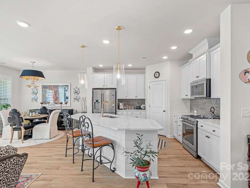 420 Quartz Hill Way, Waxhaw, NC 28173.  MLS# CAR4283852, YatesRealty ID 32951. Bar With Shiplap Details Opens To The Living & Dining Areas