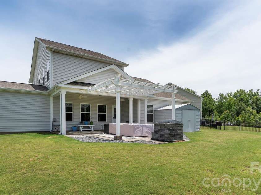 301 Contentment Drive, Locust, NC 28097.  MLS# CAR4395337, YatesRealty ID 32957. Back of the House