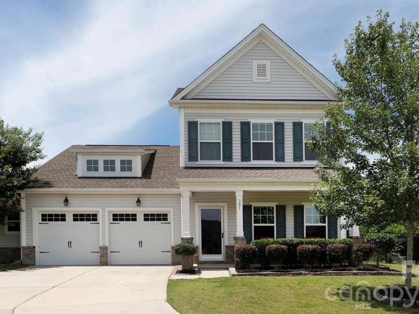 301 Contentment Drive, Locust, NC 28097.  MLS# CAR4395337, YatesRealty ID 32957. Front House 1