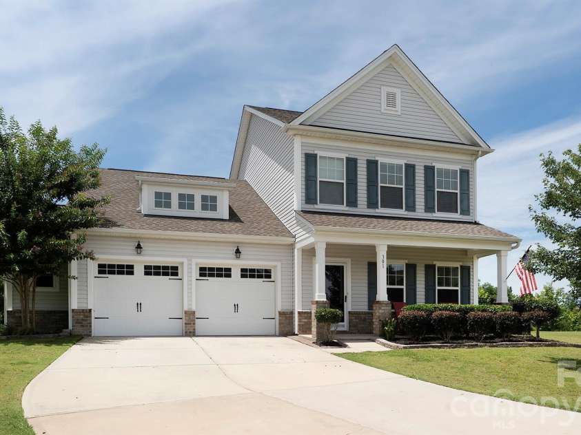 301 Contentment Drive, Locust, NC 28097.  MLS# CAR4395337, YatesRealty ID 32957. Front House