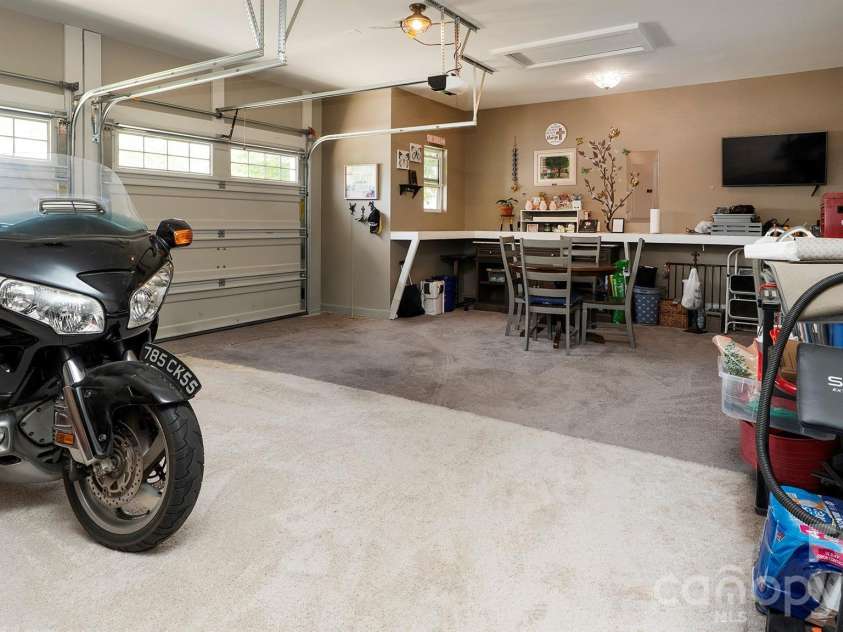 301 Contentment Drive, Locust, NC 28097.  MLS# CAR4395337, YatesRealty ID 32957. Garage