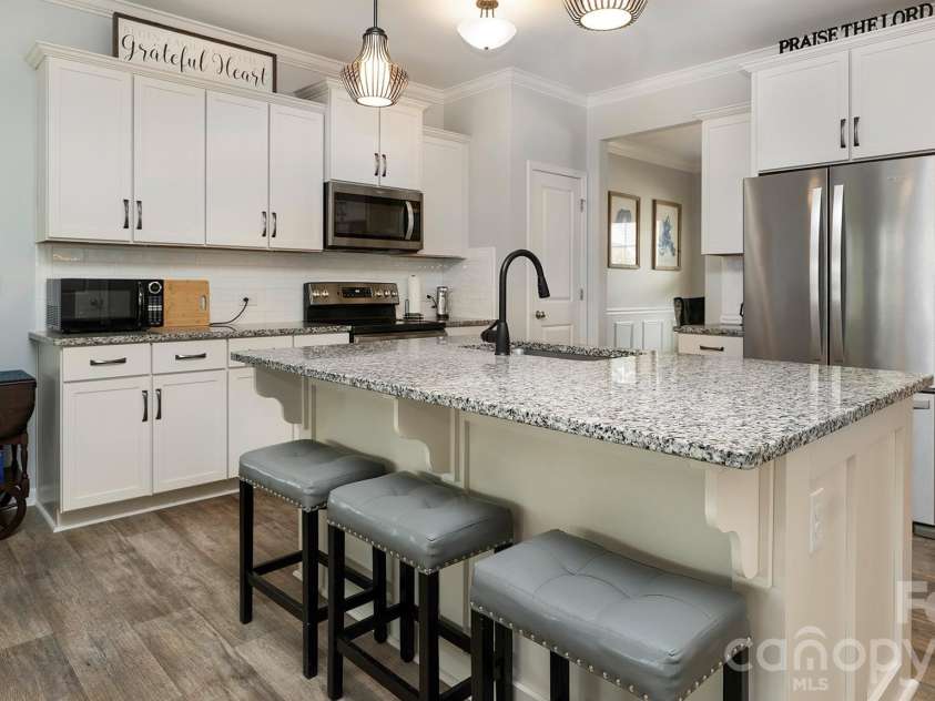 301 Contentment Drive, Locust, NC 28097.  MLS# CAR4395337, YatesRealty ID 32957. Kitchen 1