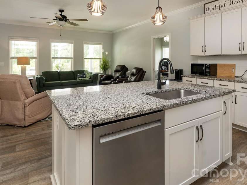 301 Contentment Drive, Locust, NC 28097.  MLS# CAR4395337, YatesRealty ID 32957. Kitchen 2