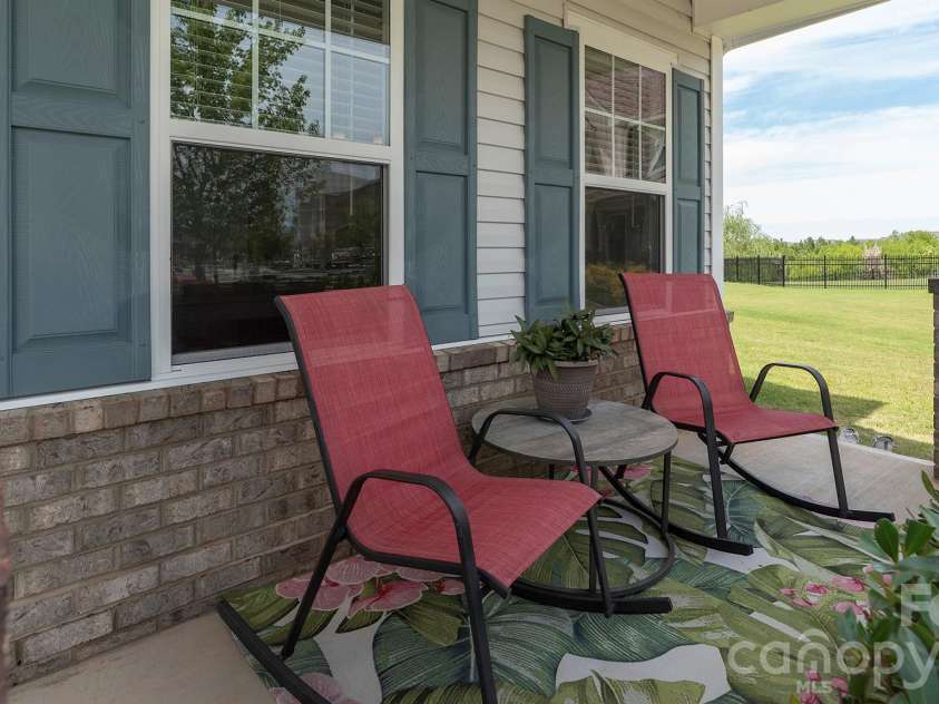 301 Contentment Drive, Locust, NC 28097.  MLS# CAR4395337, YatesRealty ID 32957. Porch