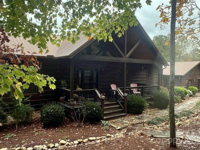 80 Grandview Loop, Nebo, NC 28761.  MLS# CAR4317495, YatesRealty ID 3296. Front of home with Fall leaves.
