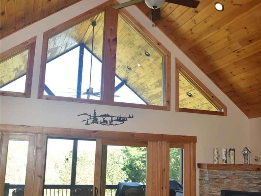 80 Grandview Loop, Nebo, NC 28761.  MLS# CAR4317495, YatesRealty ID 3296. Vaulted ceiling and large windows for natural light and long range views.