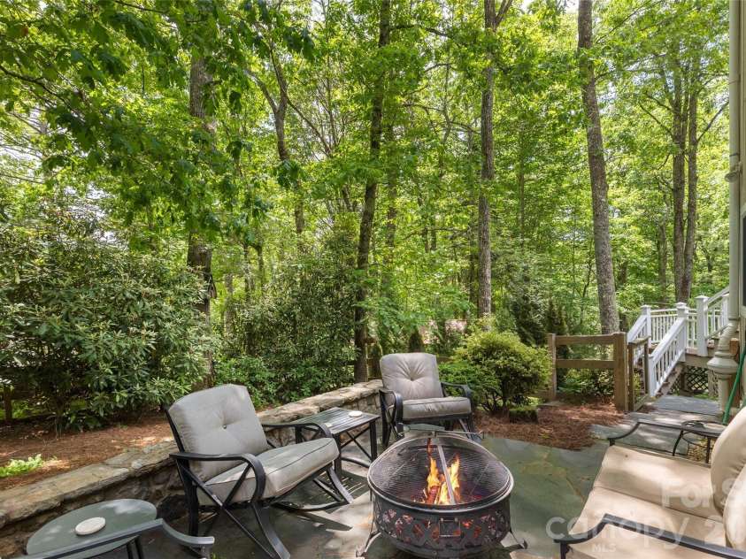 85 & 95 Ralph Thomas Road, Highlands, NC 28741.  MLS# CAR4395002, YatesRealty ID 32961. 85 Ralph Thomas Rd - Fire Pit Area in Back Yard