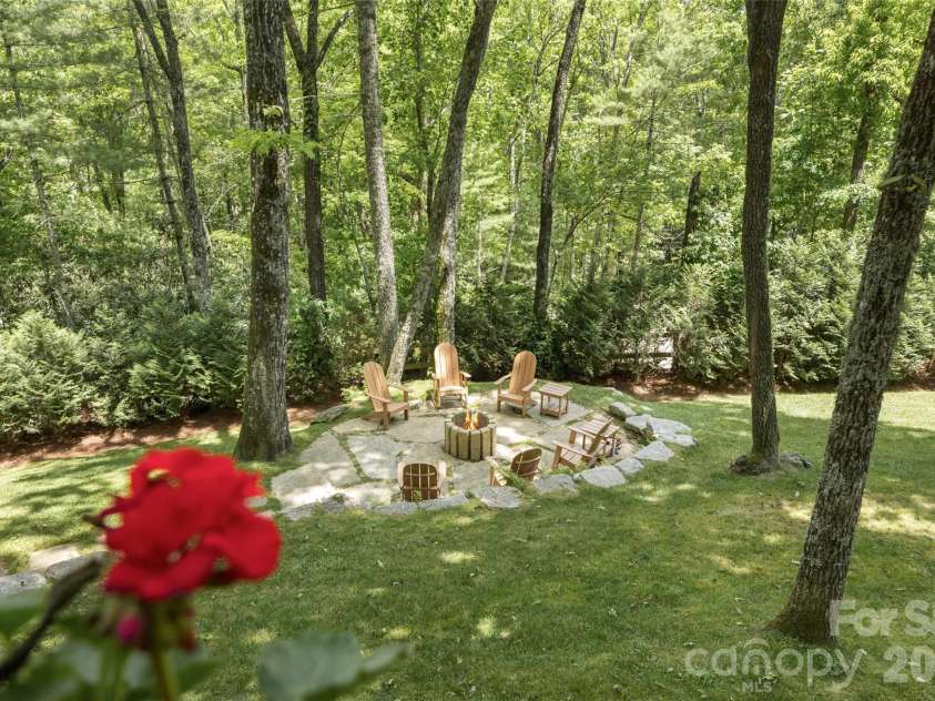 85 & 95 Ralph Thomas Road, Highlands, NC 28741.  MLS# CAR4395002, YatesRealty ID 32961. 95 Ralph Thomas Rd - Fire Pit in the Back Yard