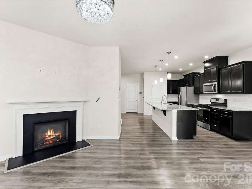 11010 Chalkbark Lane, Charlotte, NC 28262.  MLS# CAR4378415, YatesRealty ID 32962. Gas fireplace