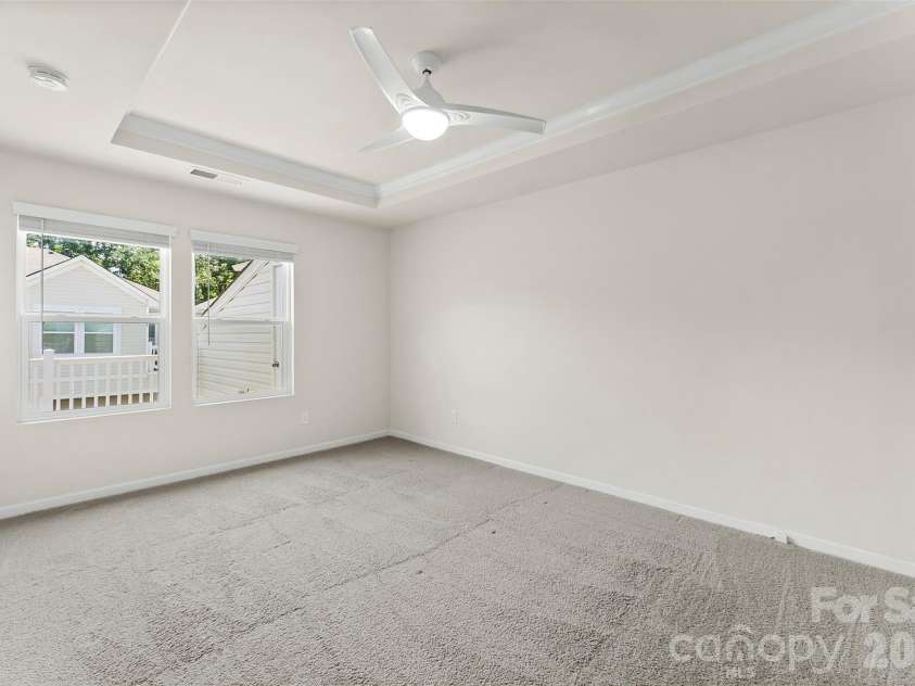 11010 Chalkbark Lane, Charlotte, NC 28262.  MLS# CAR4378415, YatesRealty ID 32962. Primary bedroom/ Tray ceilings