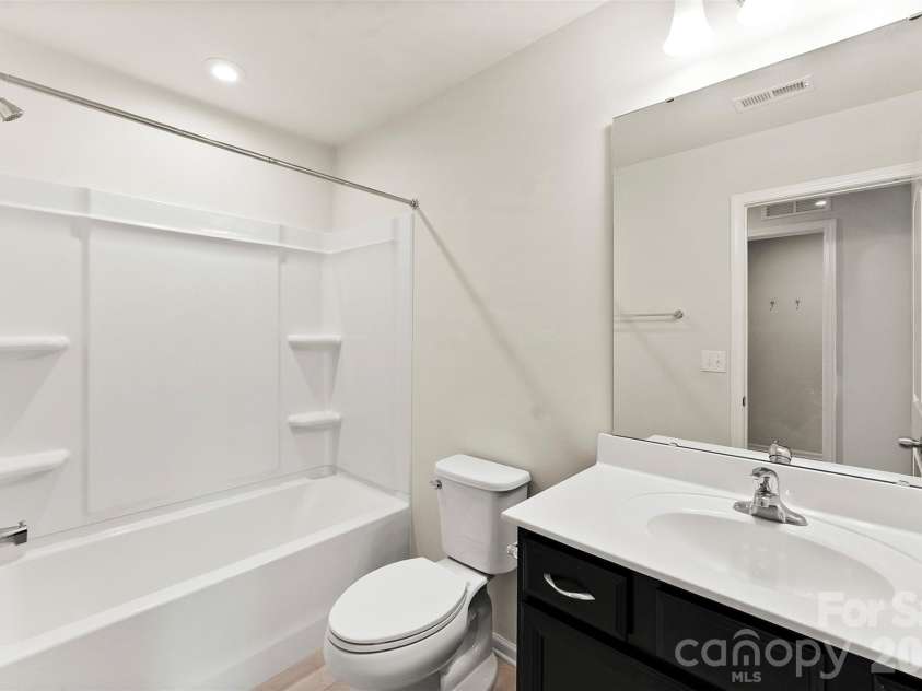 11010 Chalkbark Lane, Charlotte, NC 28262.  MLS# CAR4378415, YatesRealty ID 32962. Second full bath