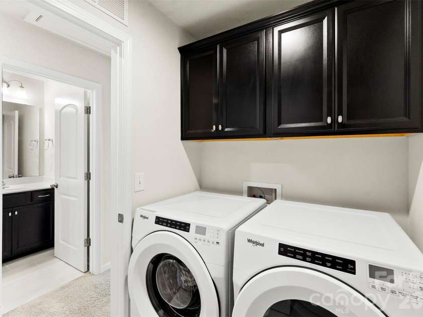 11010 Chalkbark Lane, Charlotte, NC 28262.  MLS# CAR4378415, YatesRealty ID 32962. Upper-level laundry