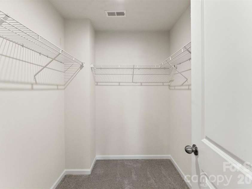 11010 Chalkbark Lane, Charlotte, NC 28262.  MLS# CAR4378415, YatesRealty ID 32962. Walk-in closet