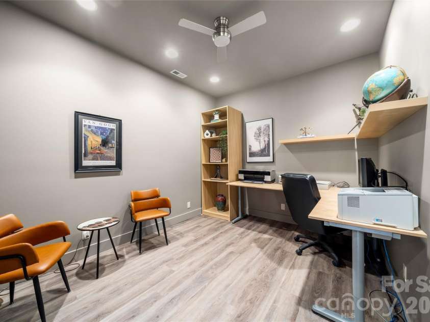 257 Bear Landing Drive, Hendersonville, NC 28792.  MLS# CAR4388350, YatesRealty ID 32963. A dedicated home office offers a quiet, refined space for work, study, or creative pursuits.