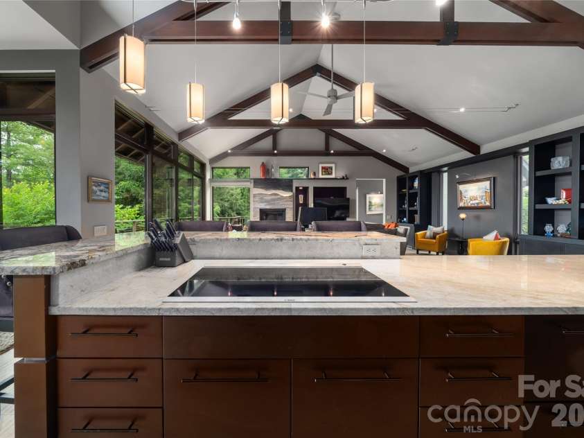 257 Bear Landing Drive, Hendersonville, NC 28792.  MLS# CAR4388350, YatesRealty ID 32963. Bosch induction cooktop with down draft ventilation.